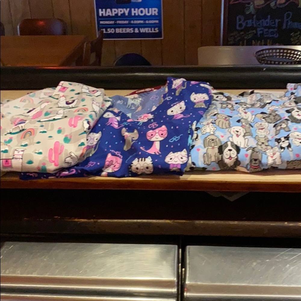 Lot of scrub tops. Nwt 4x but fit more like 3x
